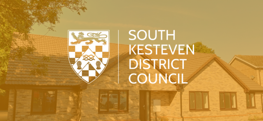 Thumbnail image of a bungalow, overlaid with a yellow and the South Kesteven District Council logo in the middle. 