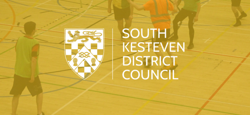Photograph of people on a sports court. Yellow screen overlaid. South Kesteven District Council logo on screen. 