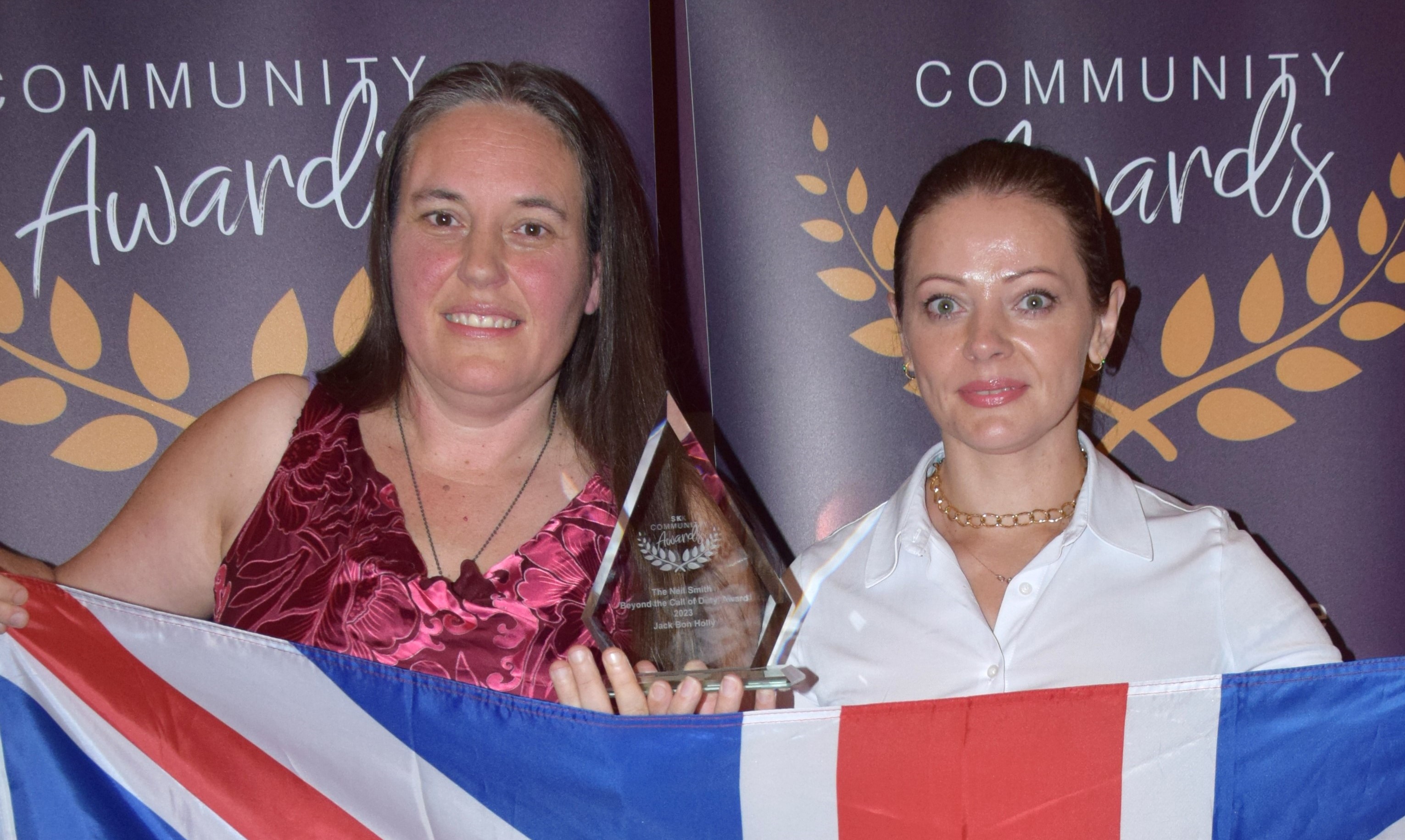 Beyond the Call of Duty - accepted by Yvette Diaz-Munoz and Liliya Natalchenko on behalf of Jack Bon Holly