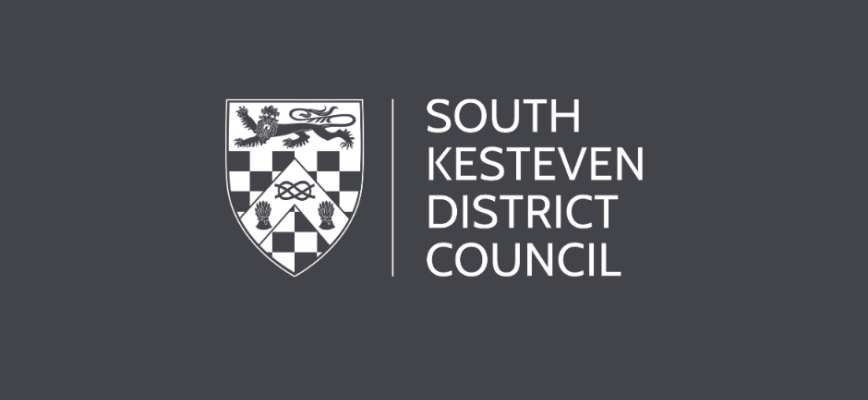 Grey screen with a South Kesteven District Logo in the centre. 