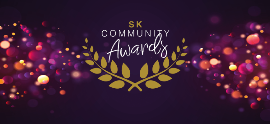 Decorative purple and gold background. SK Community Awards logo in the centre.